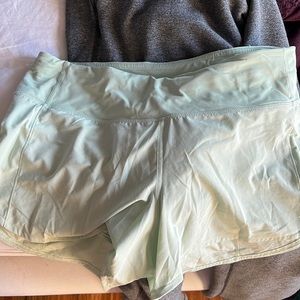 Lululemon shorts mint green 8 Tall EUC